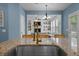 Bright kitchen view into an open floor plan with a gold faucet and granite counters at 3149 Timberline Dr, Johns Island, SC 29455