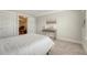 Comfortable bedroom with carpeting, a decorative table, and white bedding at 317 Fiddleback Dr, Summerville, SC 29486