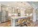 Modern kitchen with stainless steel appliances, a large island, and pendant lighting at 317 Fiddleback Dr, Summerville, SC 29486
