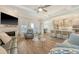 Open-concept living room seamlessly flows into a modern kitchen, perfect for entertaining guests at 317 Fiddleback Dr, Summerville, SC 29486