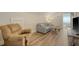 Relaxing living room features a comfortable reclining chair and a stylish couch at 317 Fiddleback Dr, Summerville, SC 29486
