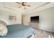 Light and bright main bedroom showing bed, large dresser, and painting at 317 Fiddleback Dr, Summerville, SC 29486
