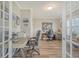 Well-lit home office with french doors, desk, and a comfortable workspace at 317 Fiddleback Dr, Summerville, SC 29486