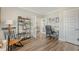Home office featuring built-in shelving, desk space, and natural light with views to the foyer at 317 Fiddleback Dr, Summerville, SC 29486