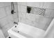 This bathroom features white marble tile and a built-in shower niche at 32 Heathwood Dr, Charleston, SC 29407