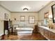 Elegant bathroom featuring a standalone tub, herringbone wood floors, and stylish fixtures at 333 W Confederate Cir, Charleston, SC 29407
