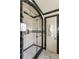 Modern bathroom with a glass-enclosed shower, black and white tile, and a classic design at 333 W Confederate Cir, Charleston, SC 29407