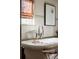 Close-up of soaking tub featuring chrome faucet and fixtures with wood blinds in the window at 333 W Confederate Cir, Charleston, SC 29407