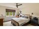 Cozy bedroom with natural light, ceiling fan, and curated decor at 333 W Confederate Cir, Charleston, SC 29407