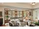 Elegant dining area adjacent to the living room with views of the lush outdoor scenery at 333 W Confederate Cir, Charleston, SC 29407