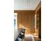 Stylish dining room features wood paneled walls, built-in shelving, and modern lighting fixtures at 333 W Confederate Cir, Charleston, SC 29407