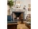 Cozy living room showcasing a marble fireplace, decorative mirror, and elegant furnishings at 333 W Confederate Cir, Charleston, SC 29407