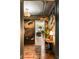 Hallway with view into the living and dining areas, and muraled wall at 333 W Confederate Cir, Charleston, SC 29407