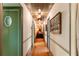 Hallway with paneled walls, recessed lights, and an orange runner rug for a bright, modern look at 333 W Confederate Cir, Charleston, SC 29407