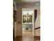 Open doorway view of a kitchen with pendant lighting, marble counters, and shelving at 333 W Confederate Cir, Charleston, SC 29407
