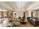 Bright and airy living room with decorative ceiling, stylish seating, and access to multiple rooms at 333 W Confederate Cir, Charleston, SC 29407