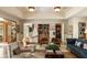 Chic living room featuring a custom bar area, stylish furnishings, and decorative ceiling at 333 W Confederate Cir, Charleston, SC 29407