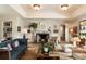Stylish living room featuring a fireplace, comfortable seating, and elegant decor at 333 W Confederate Cir, Charleston, SC 29407