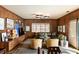 Inviting living room featuring rich wood paneling, plush seating, and stylish decor at 333 W Confederate Cir, Charleston, SC 29407