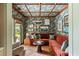 Cozy living room with patterned wallpaper, plush seating, and an abundance of natural light at 333 W Confederate Cir, Charleston, SC 29407