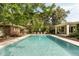 Full pool view featuring the manicured backyard and covered patio at 333 W Confederate Cir, Charleston, SC 29407