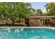 Inviting outdoor pool area with manicured lawn and poolside seating at 333 W Confederate Cir, Charleston, SC 29407