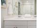 Bright bathroom with double sinks, white vanity, and a large mirror at 339 Pine Crest View Dr, Summerville, SC 29486
