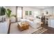 Inviting living room with a comfortable sofa, stylish coffee table, neutral rug, and dining area at 339 Pine Crest View Dr, Summerville, SC 29486