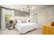 Main bedroom with a statement accent wall, stylish light fixture, and large window at 339 Pine Crest View Dr, Summerville, SC 29486