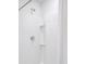 Modern shower with white tile surround and built-in shelving at 339 Pine Crest View Dr, Summerville, SC 29486