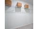 Walk-in closet with installed white wire shelving and woven baskets at 339 Pine Crest View Dr, Summerville, SC 29486