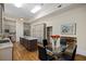 A modern kitchen with gray cabinets, stainless steel appliances, and an island with granite countertops at 34 Smith St, Charleston, SC 29401