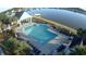 Breathtaking aerial view of the community pool, showcasing its design and tranquil setting by the lake at 3438 Great Egret Dr, Johns Island, SC 29455