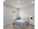 Cozy bedroom featuring neutral paint, carpet, and a bright window, perfect for relaxation at 3438 Great Egret Dr, Johns Island, SC 29455