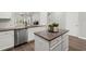 Kitchen island with stainless steel appliances, granite countertops, and white cabinetry at 3438 Great Egret Dr, Johns Island, SC 29455