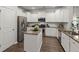 Modern kitchen with stainless steel appliances, granite countertops, and white cabinetry at 3438 Great Egret Dr, Johns Island, SC 29455