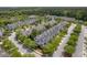 Aerial view of a community featuring townhomes, mature trees, and common areas with swimming pool and recreation at 4020 Conant Rd, Mount Pleasant, SC 29466