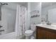 Bathroom featuring a shower-tub combo with bronze hardware and a decorative dolphin-themed towel rack at 4020 Conant Rd, Mount Pleasant, SC 29466