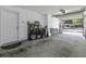 Spacious garage with ample storage shelving and a view to the outside at 4020 Conant Rd, Mount Pleasant, SC 29466