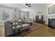 Bright living room with hardwood floors, stylish furniture, and a cozy fireplace at 4020 Conant Rd, Mount Pleasant, SC 29466