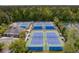 Aerial view of a community tennis court with shaded seating area at 4020 Conant Rd, Mount Pleasant, SC 29466