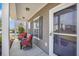 Inviting front porch with seating, providing a relaxing outdoor space at 403 Fox Sparrow Ct, Summerville, SC 29486