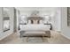 Bright bedroom showcasing a large bed, soft lighting, and stylish bedside tables at 4115 Rising Tide Dr, Summerville, SC 29485