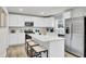 Modern kitchen with stainless steel appliances, center island, and ample counter space for cooking at 4115 Rising Tide Dr, Summerville, SC 29485