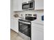 New stainless steel oven and microwave in a bright kitchen with white cabinets and white countertops at 4115 Rising Tide Dr, Summerville, SC 29485