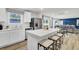 Bright modern kitchen with stainless appliances, a kitchen island, and open concept design at 4115 Rising Tide Dr, Summerville, SC 29485