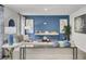 Comfortable living room showcasing stylish decor, a bold accent wall, and modern furniture at 4115 Rising Tide Dr, Summerville, SC 29485
