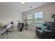 Spare bedroom featuring carpet floors, a desk and large chair at 4143 Rigsby Ln, Charleston, SC 29414