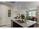 Open concept kitchen with island bar seating and hardwood flooring at 4143 Rigsby Ln, Charleston, SC 29414