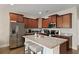 Modern kitchen with granite countertops, stainless steel appliances, and a central island with seating at 4143 Rigsby Ln, Charleston, SC 29414